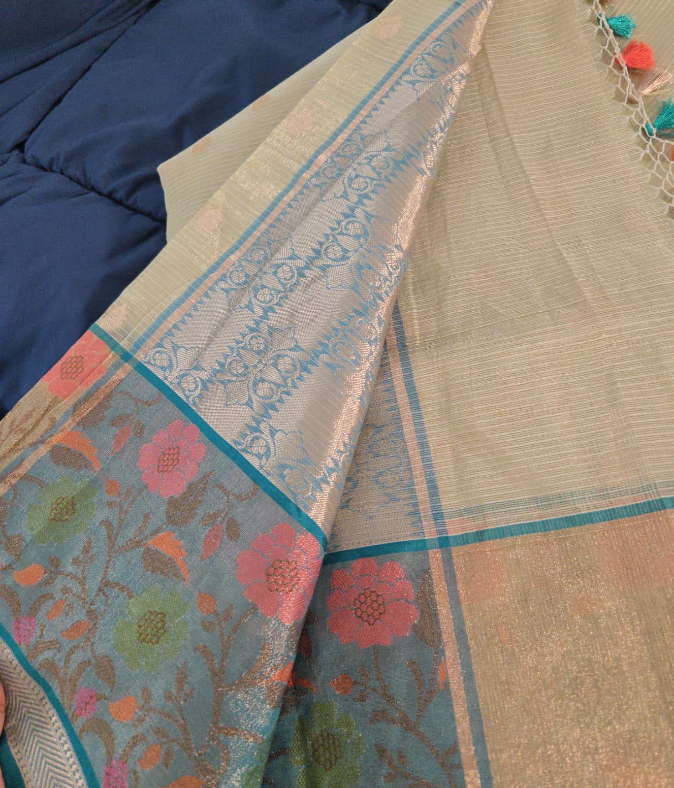 Elegant cream/ off-white Organza Saree with Multicolour Embroidery – Festive & Wedding Wear