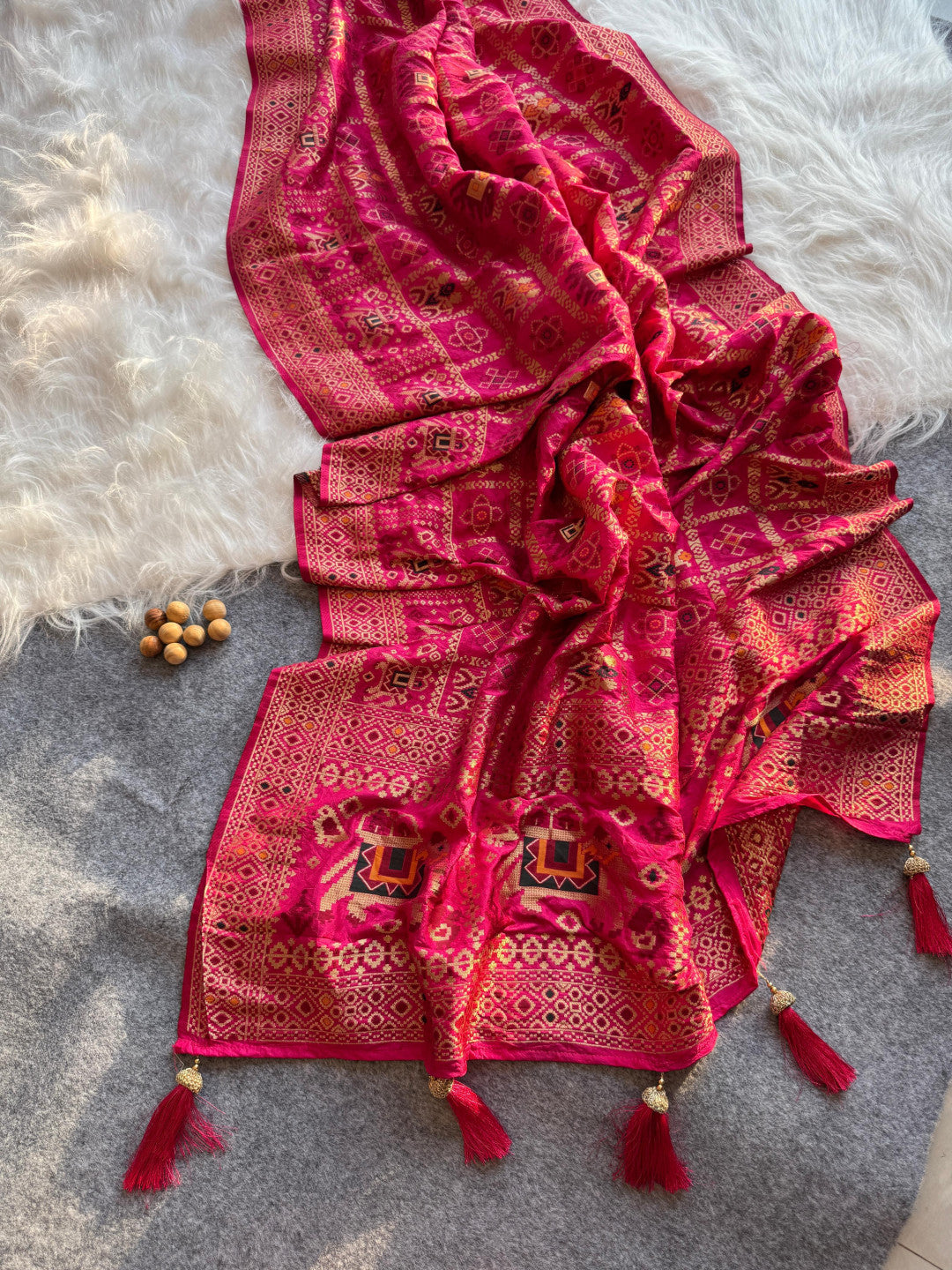 Traditional patola silk saree with meenakari zari weaving work