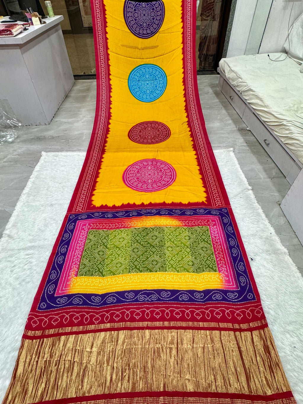 Multi color pure gajji silk saree with bandhej print and lagadi pallu work