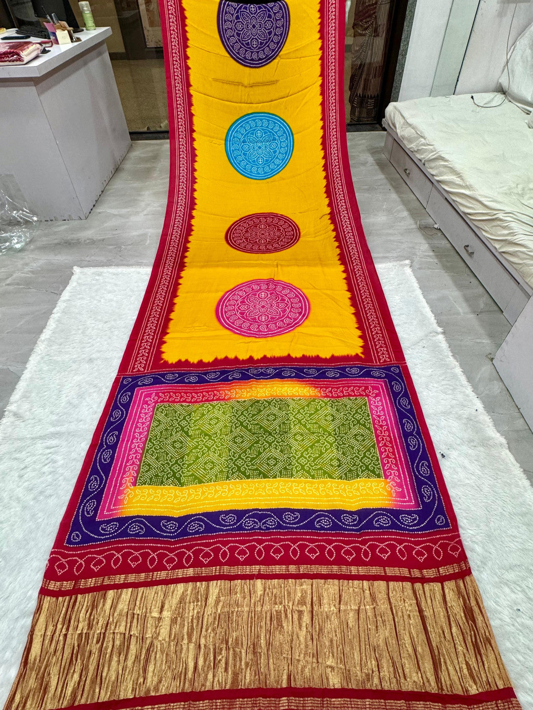 Multi color pure gajji silk saree with bandhej print and lagadi pallu work