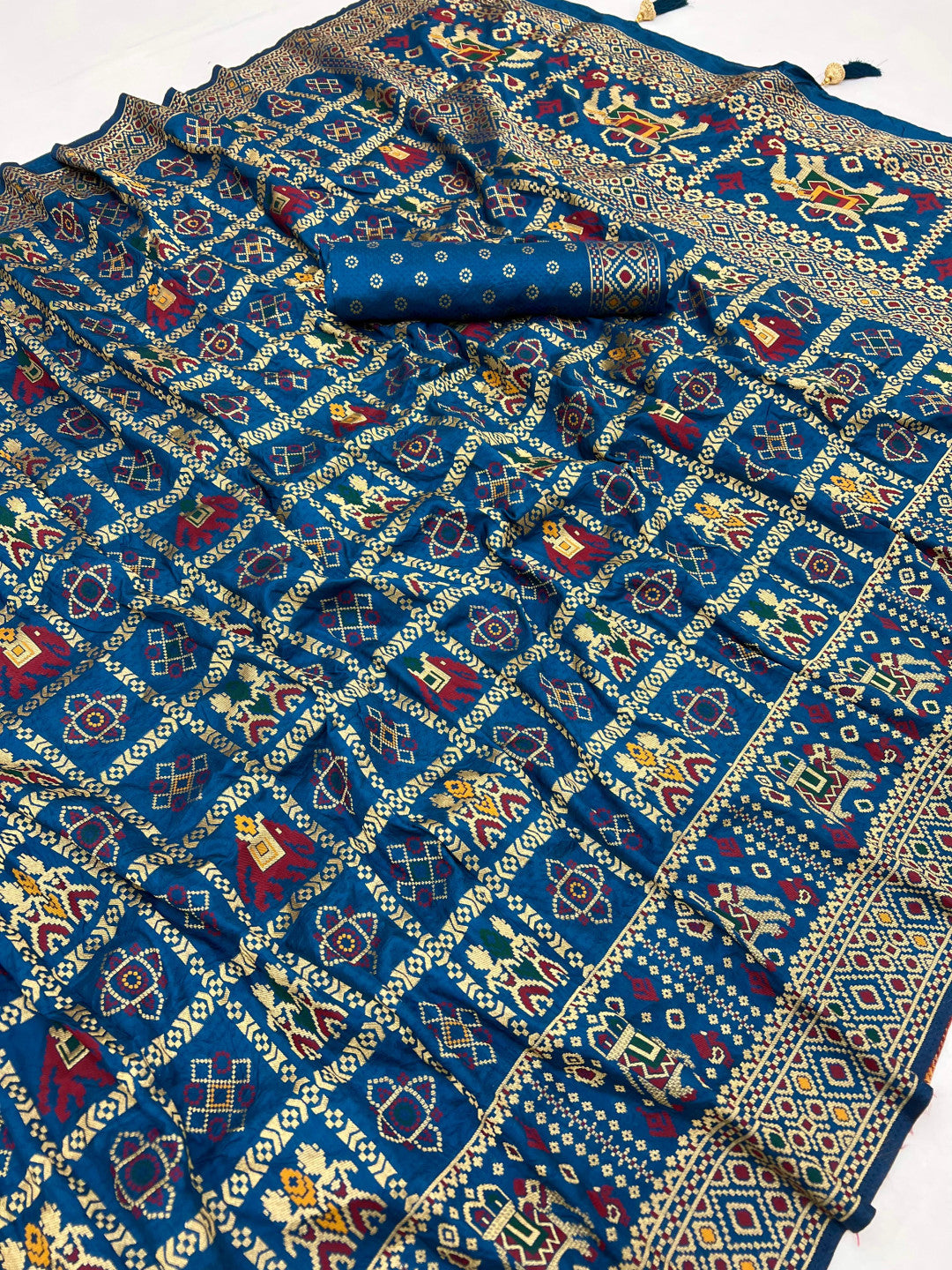 Traditional patola silk saree with meenakari zari weaving work