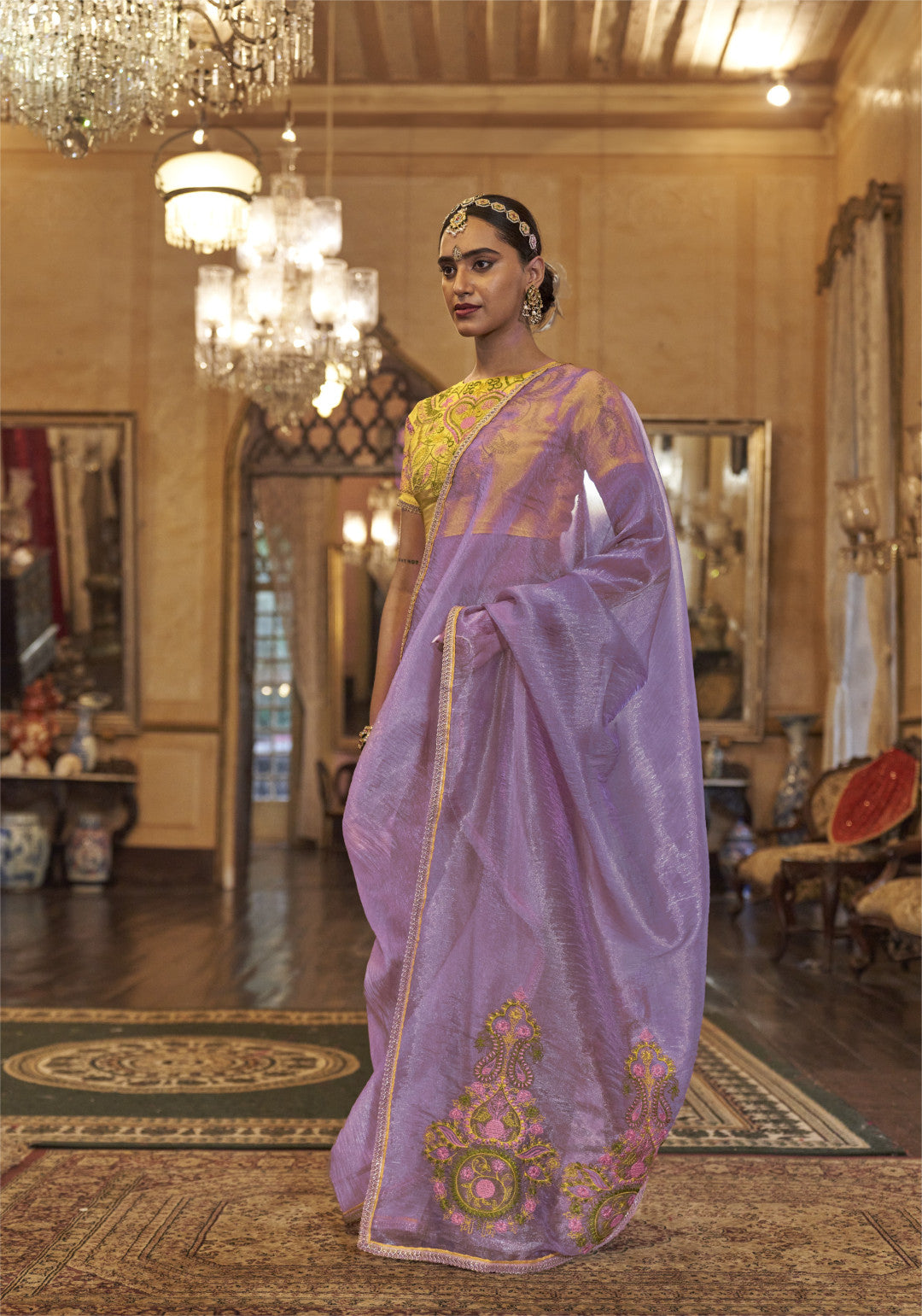 Purple color gold soft tissue silk saree with multi thred embroidery work