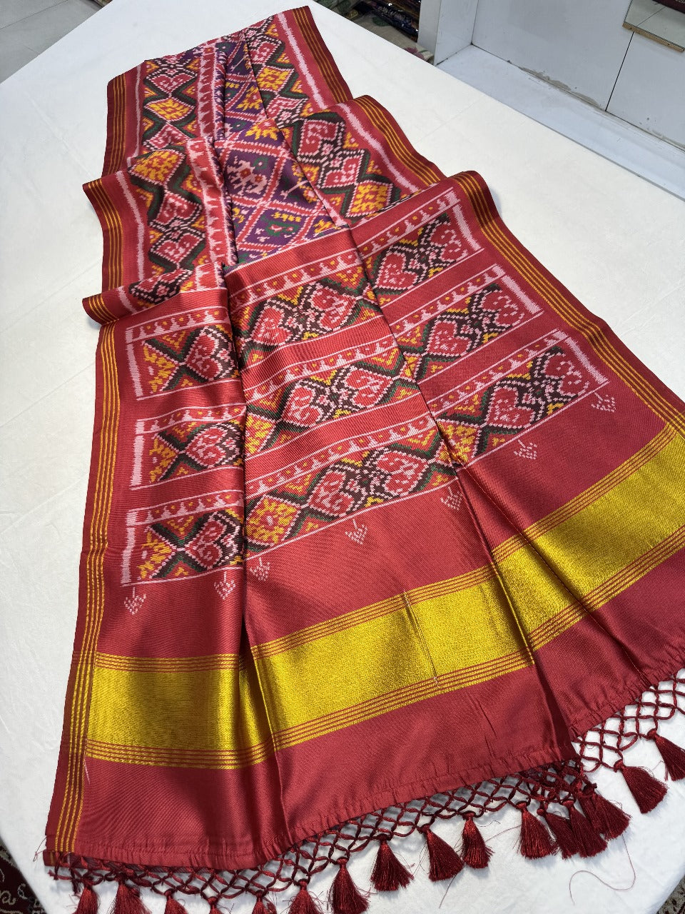 Patola silk saree with double ikkat printed work