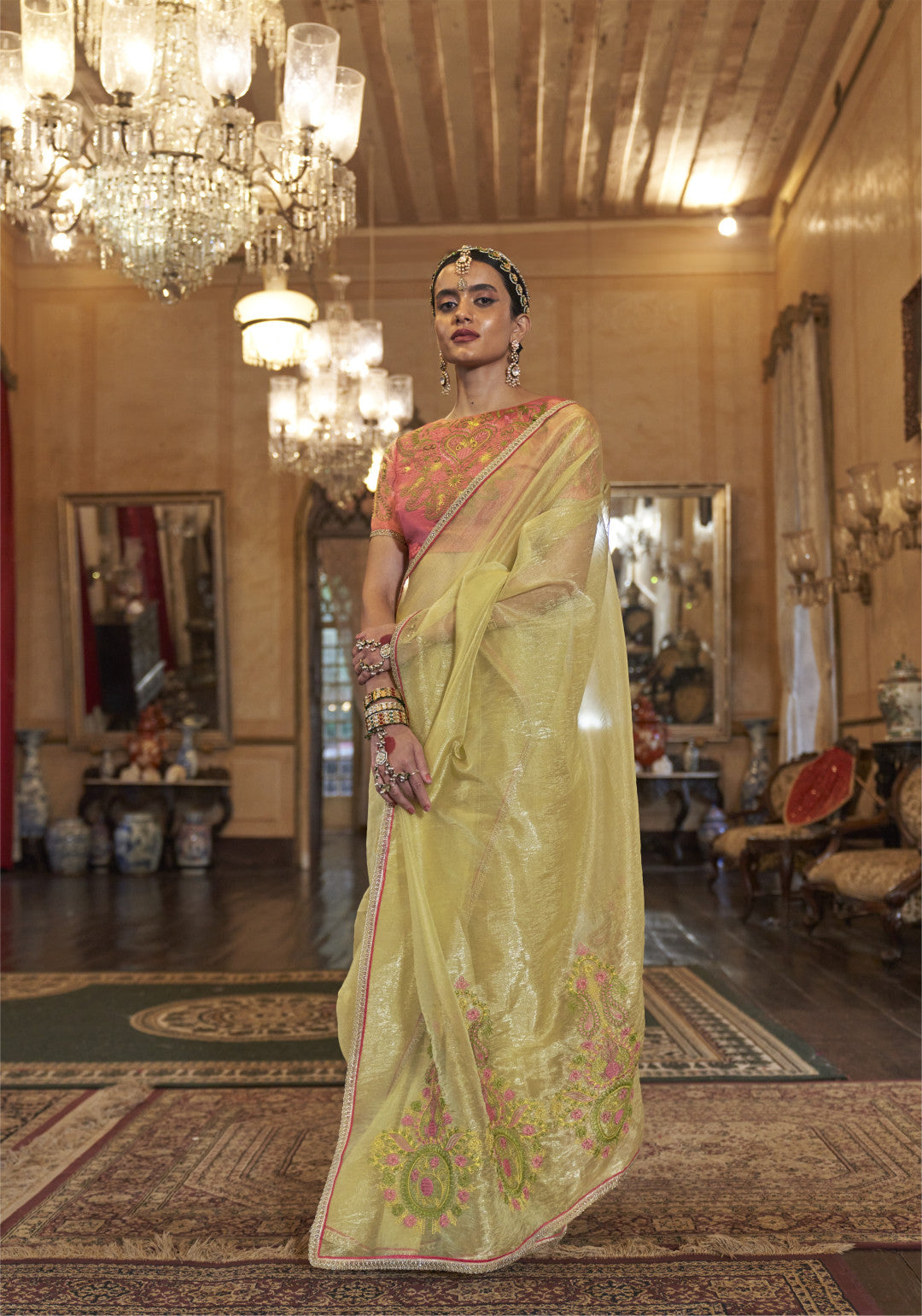 Yellow color gold soft tissue silk saree with multi thred embroidery work