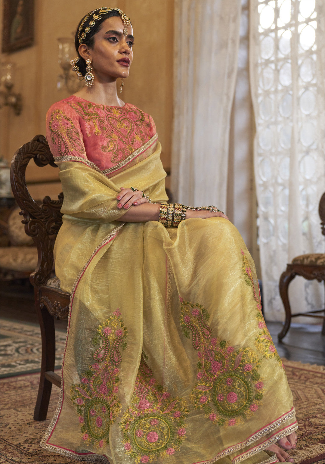 Yellow color gold soft tissue silk saree with multi thred embroidery work