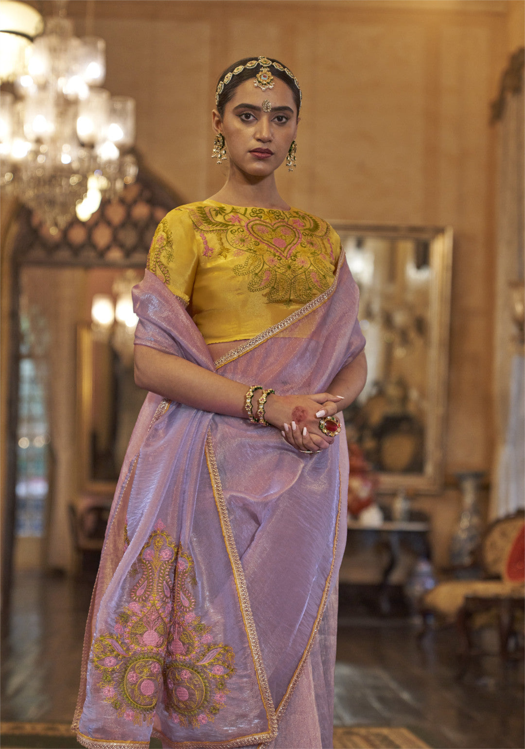 Purple color gold soft tissue silk saree with multi thred embroidery work