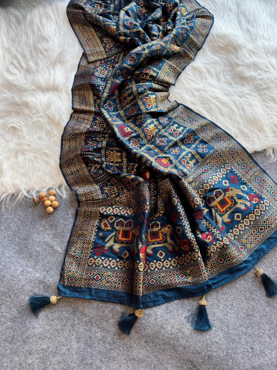 Traditional patola silk saree with meenakari zari weaving work