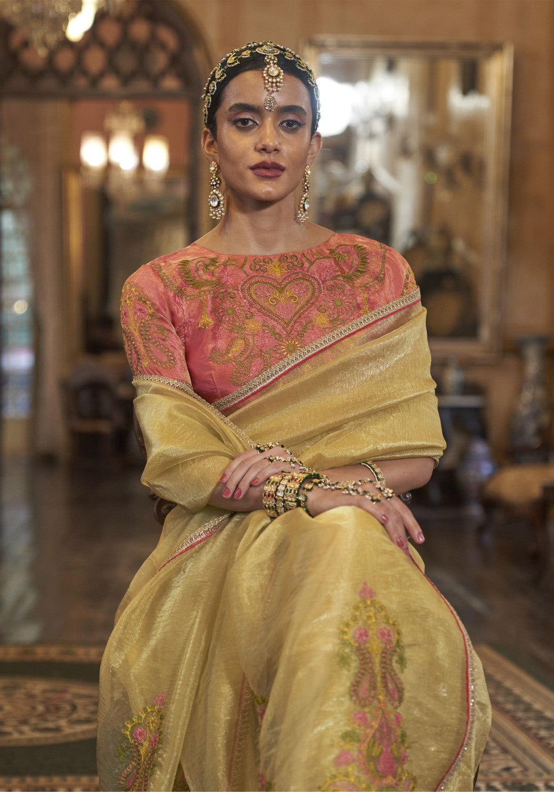 Yellow color gold soft tissue silk saree with multi thred embroidery work