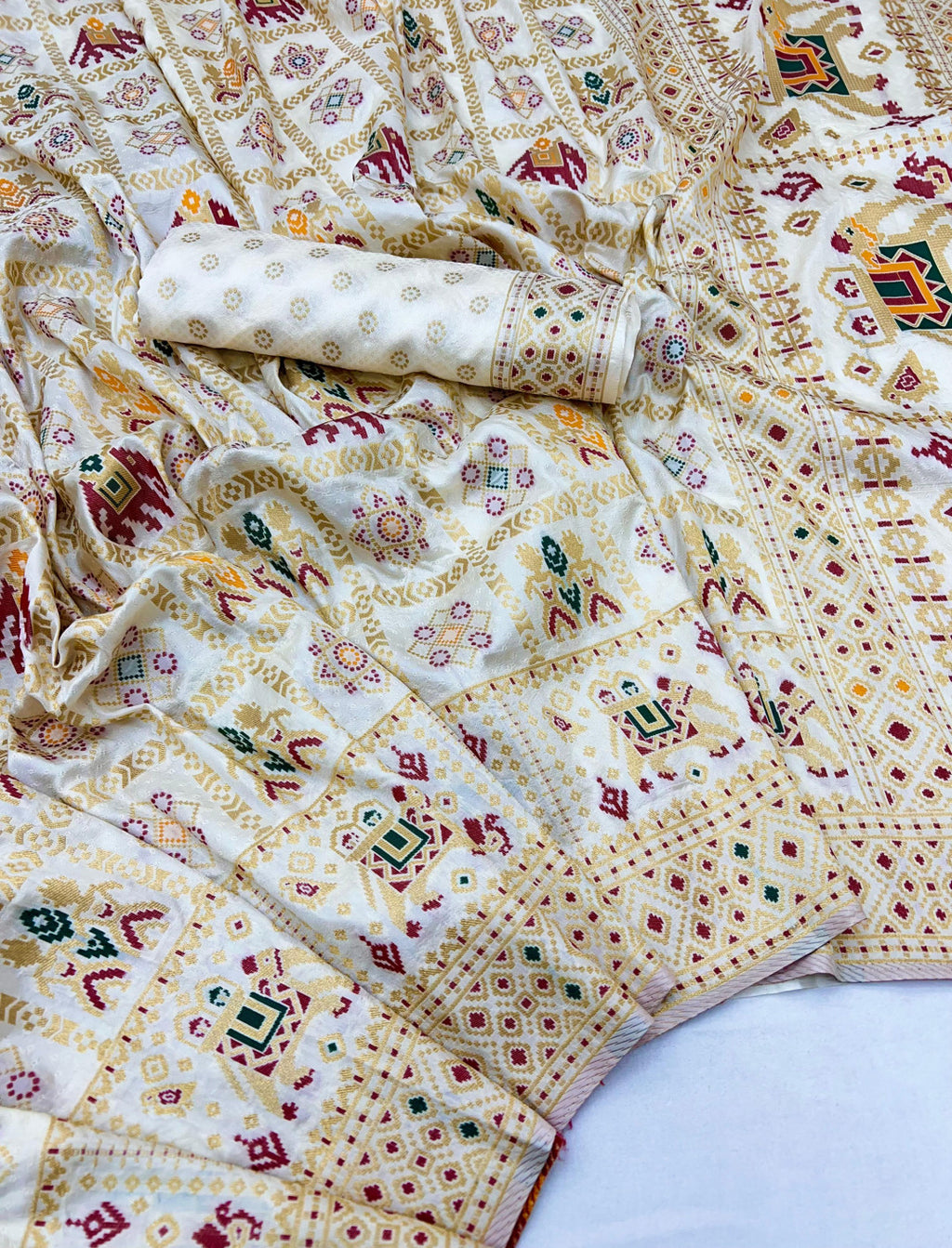 Traditional patola silk saree with meenakari zari weaving work