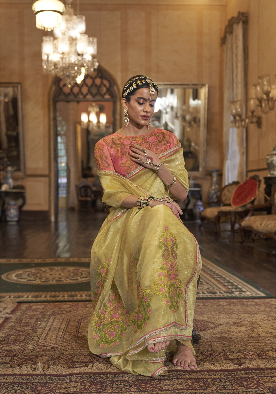 Yellow color gold soft tissue silk saree with multi thred embroidery work