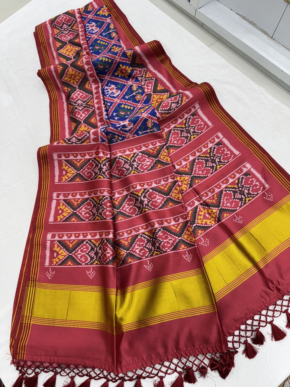 Patola silk saree with double ikkat printed work
