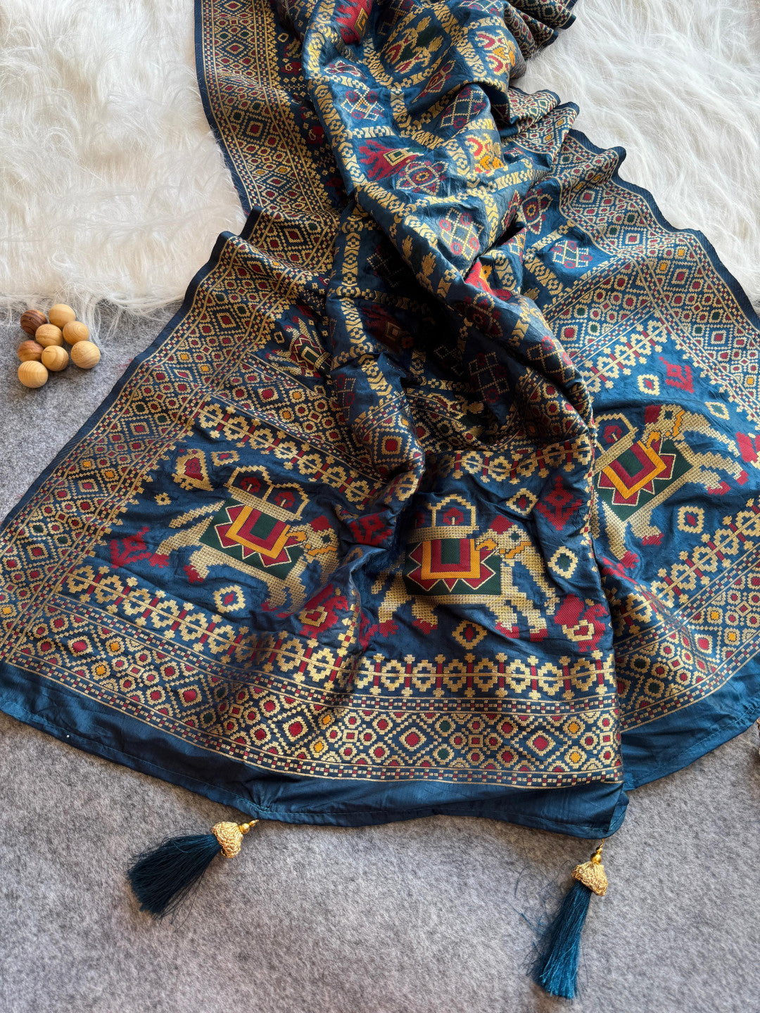 Traditional patola silk saree with meenakari zari weaving work