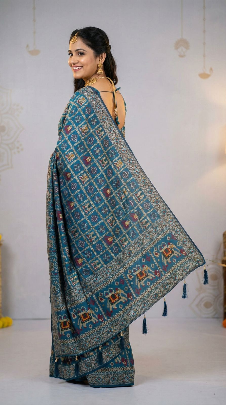 Traditional patola silk saree with meenakari zari weaving work