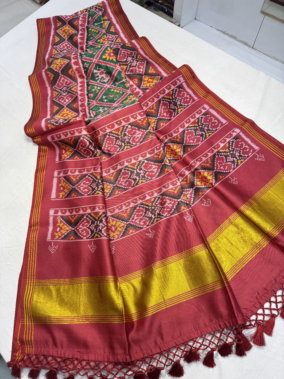 Patola silk saree with double ikkat printed work
