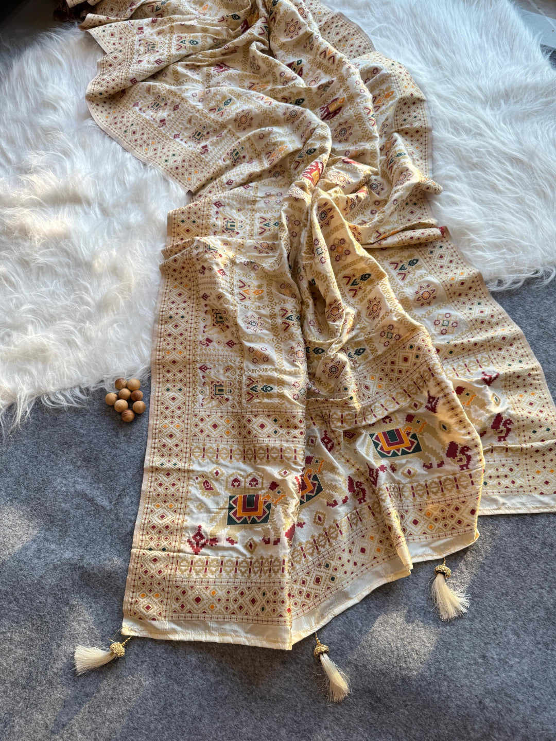 Traditional patola silk saree with meenakari zari weaving work