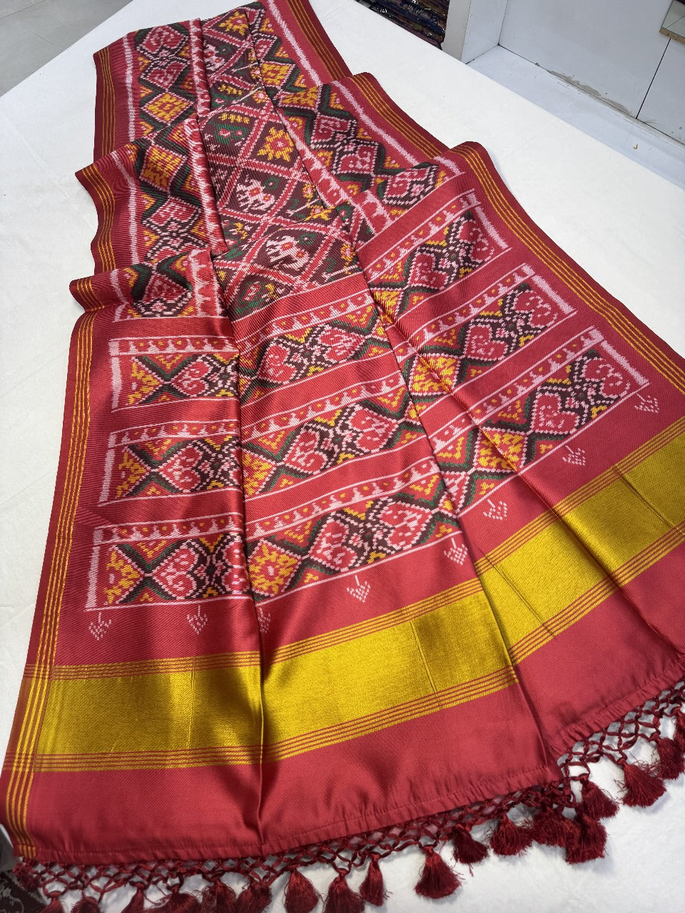 Patola silk saree with double ikkat printed work