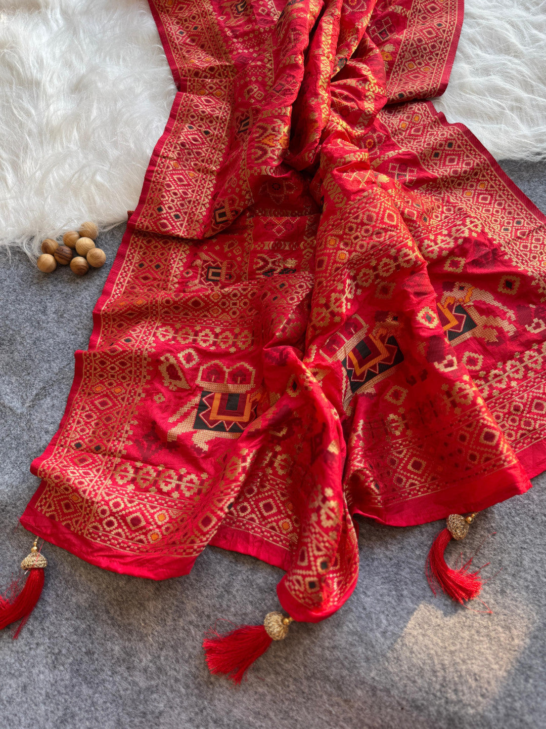 Traditional patola silk saree with meenakari zari weaving work