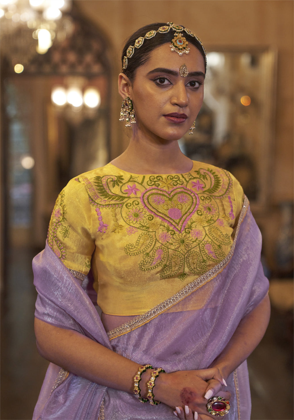Purple color gold soft tissue silk saree with multi thred embroidery work