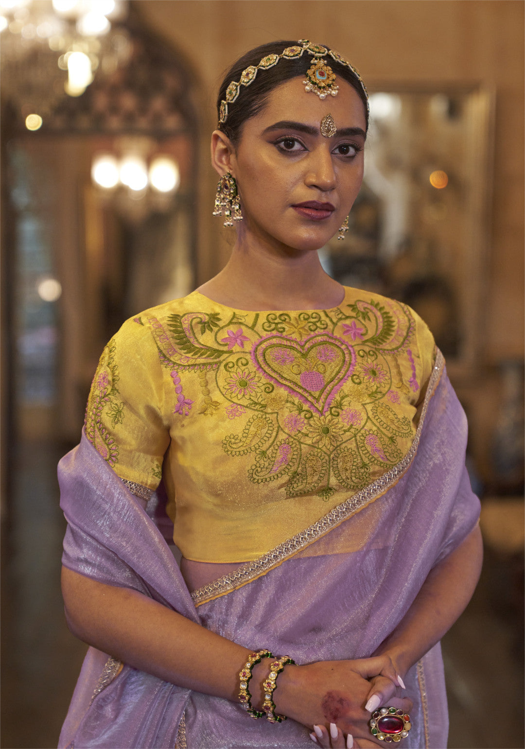 Purple color gold soft tissue silk saree with multi thred embroidery work